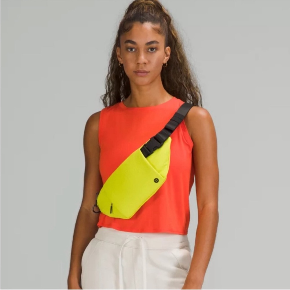 Lululemon yellow/green multi pocket belt bag